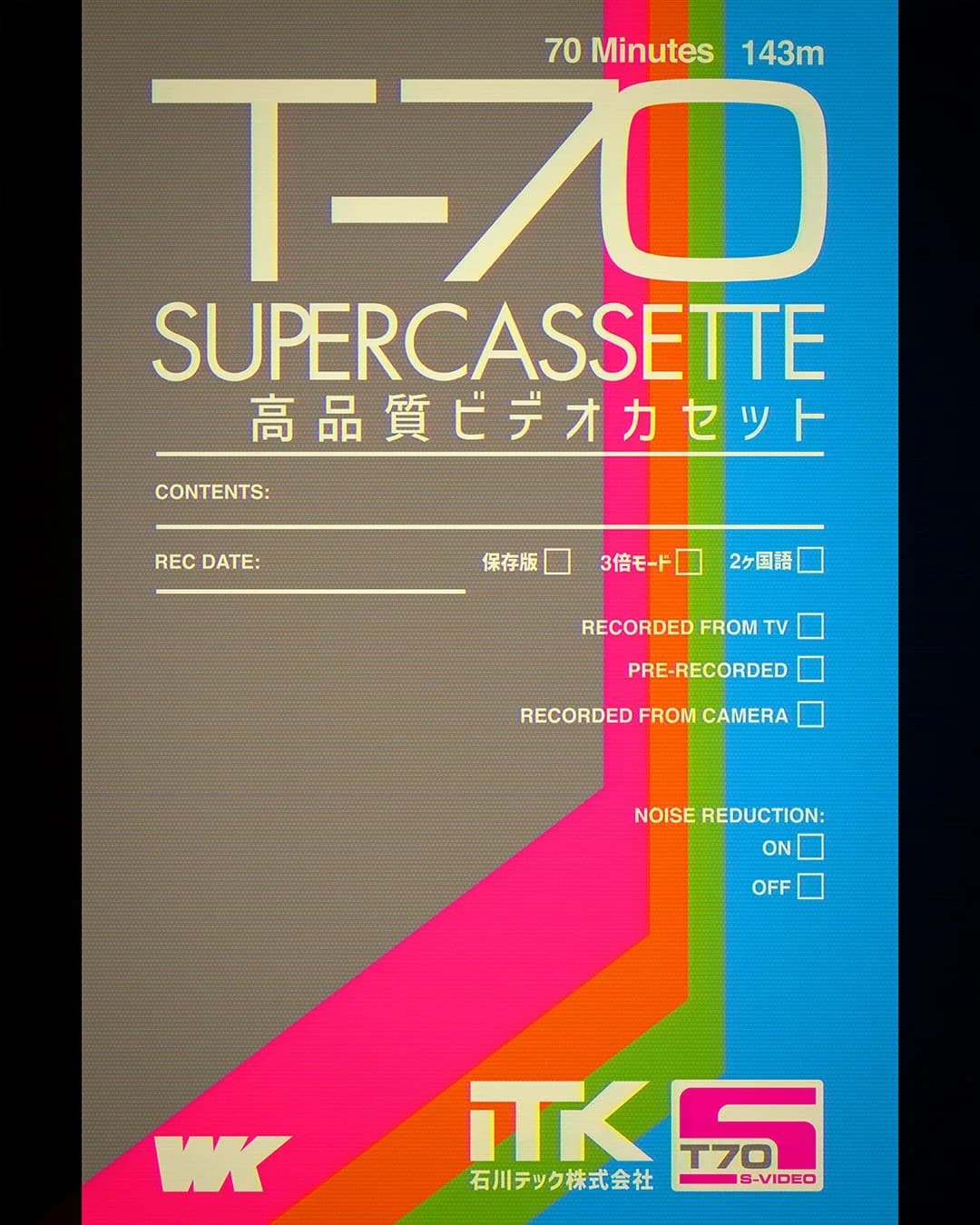 Contemporary T-70 technical cassette label with a grey layout, vertical blue panel, sweeping rainbow bands and recording-control details.
